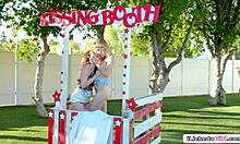 COLLEGE LESBIANS LICK PUSSY In PUBLIC Kissing Booth