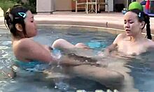 Tiny Tabby and lesbian friend finger clits poolside after swim