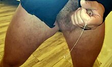 Kinky babe strips rips clothes bares feet for muscular tease