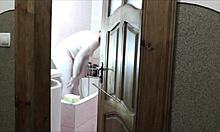 whoa sexy blonde milf in bathroom no panties roommate spies and jerks outside 👀💦🚿