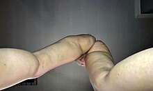 Hot tattooed blonde babe dances nude solo close-up flaunting curvy body big pussy lips muscular form