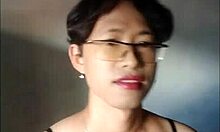 Amateur shemale in black bra stockings cums hard on handkerchief using dildo solo