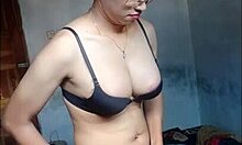 Amateur shemale in black bra stockings cums hard on handkerchief using dildo solo