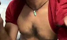 three guys crowd bathroom stall for sneaky hand grabs