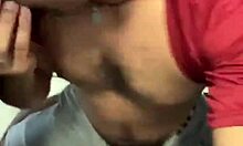 three guys crowd bathroom stall for sneaky hand grabs