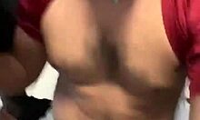 three guys crowd bathroom stall for sneaky hand grabs