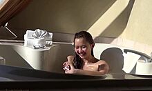 Cute Asian teen 18yo teases in hot tub with vibrating toy play