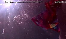 nikita vodorezova strips her redhead tits naked fast right underwater in the pool.