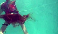 nikita vodorezova strips her redhead tits naked fast right underwater in the pool.