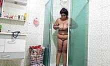 Feel the steam as stepmom showers flaunting her huge natural big tits and fat bbw pussy curves