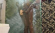 ebony milf tests shower toy then bends for caught black pounding