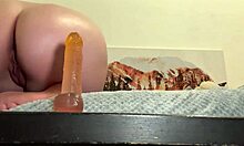 blonde rides dildo ass facing cam till she squirts