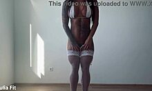 Tanned milf in stockings rides hard cums on hairy black pussy closeup