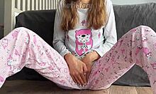 Asian teen in pajamas fingers shaved pussy to massive squirt closeup