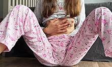 Asian teen in pajamas fingers shaved pussy to massive squirt closeup