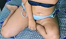 Indian beauty squeezes massive boobs while fingering wet hairy pussy