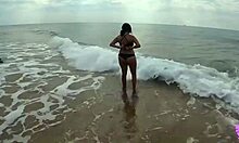 Busty Española Pounds Pussy on Public Beach.