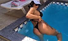 Watch me flash my big clit and juicy pussy by the pool getting all exhibitionist wet