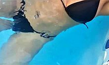 Watch me flash my big clit and juicy pussy by the pool getting all exhibitionist wet