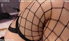 sexy camgirl plays with perfect tits on webcam