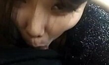 Pretty Chinese Teen Sucks Cock Deep in Close-Up Action