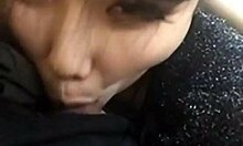 Pretty Chinese Teen Sucks Cock Deep in Close-Up Action