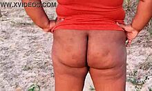 She flashes massive ass and dripping pussy right in public view