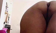 Latina BBW with big hairy ass masturbates solo on bed in homemade close-up