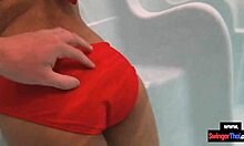 amateur teen couple teases foreplay in public pool then bangs doggystyle outdoors