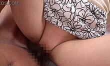 beautiful busty japanese milf neighbor shakes huge natural tits in bed.