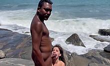 Big black cock ravages young blonde teen lover hard on the beach