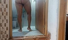 holy shit this horny colombian milf sneaks to my bathroom door rubbing her fat pussy wild