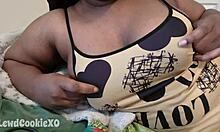 ebony bbw moans as tongue licks and sucks her big natural titties