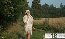 cute redhead teen wanders field fingering wet shaved pussy