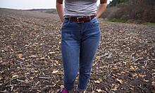 milf teases fat cameltoe pussy lips through tight blue jeans outdoors