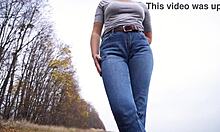 milf teases fat cameltoe pussy lips through tight blue jeans outdoors