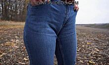 milf teases fat cameltoe pussy lips through tight blue jeans outdoors