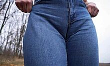 milf teases fat cameltoe pussy lips through tight blue jeans outdoors