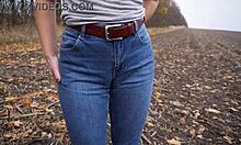milf teases fat cameltoe pussy lips through tight blue jeans outdoors