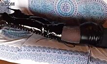 Petite milf shines in total black fishnets pantyhose boots