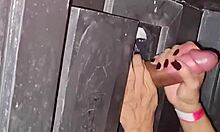 Naughty milf sneaks to gloryhole for cock sucking