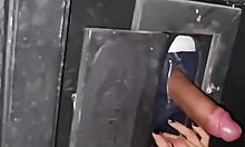 Naughty milf sneaks to gloryhole for cock sucking