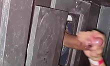 Naughty milf sneaks to gloryhole for cock sucking