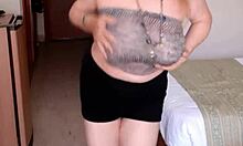 mariaold milf shakes massive tits while fingering shaved mature pussy hard