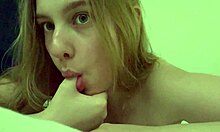 Curious teen blonde teases wet pussy close-up on massive king size bed