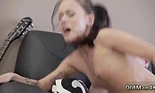 old man drags young brunette babe to dungeon for guitar hero blowjob session