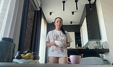 damn this sexy brunette's big shaved ass flashes bare during housework!!
