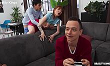 gamer girl with tattoos bends over for athletic redhead doggystyle pounding