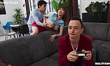 gamer girl with tattoos bends over for athletic redhead doggystyle pounding