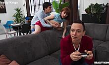 gamer girl with tattoos bends over for athletic redhead doggystyle pounding